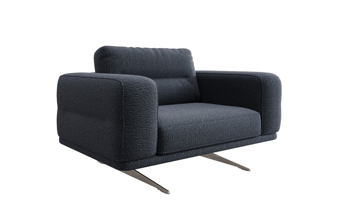 Fauteuil design Torino avec accoudoirs en Bouclé