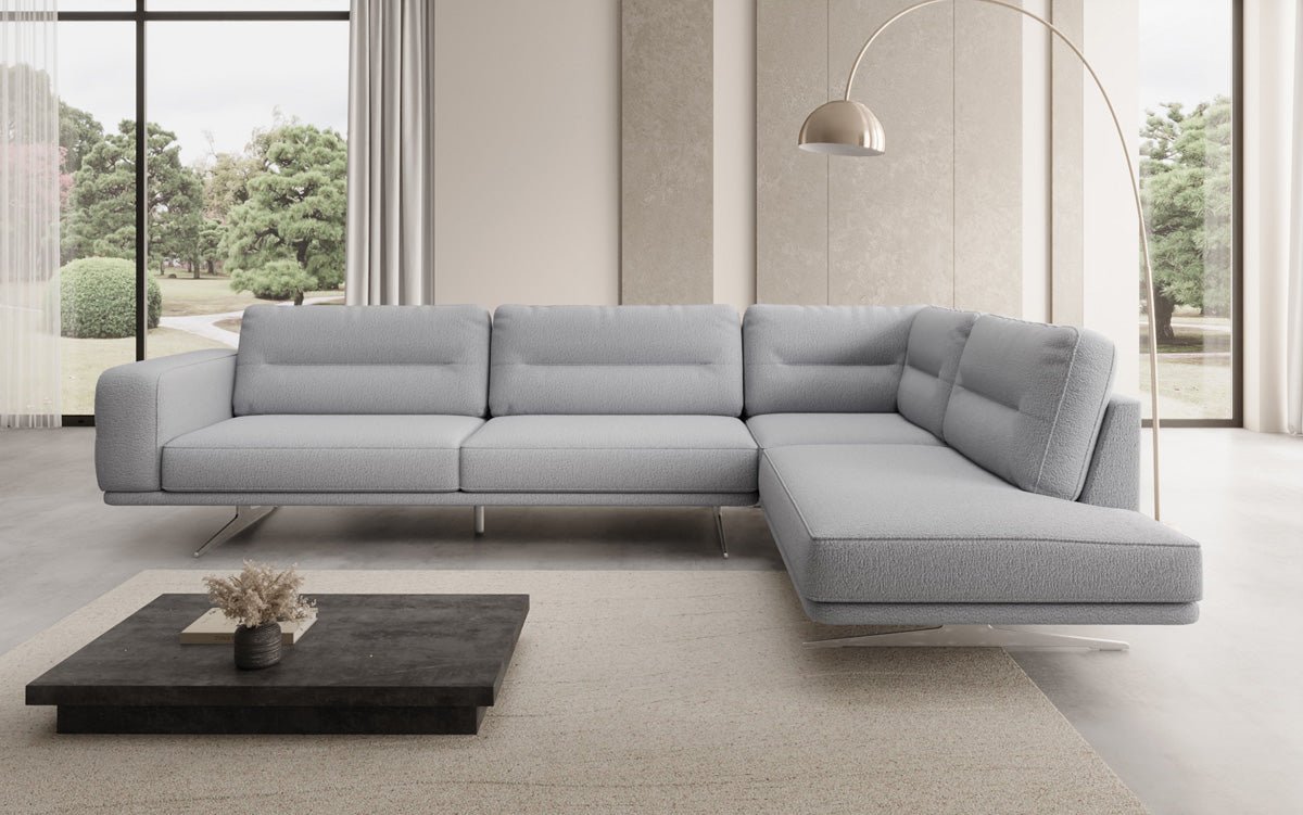 Designer-L-Sofa zou Torino am Bouclé