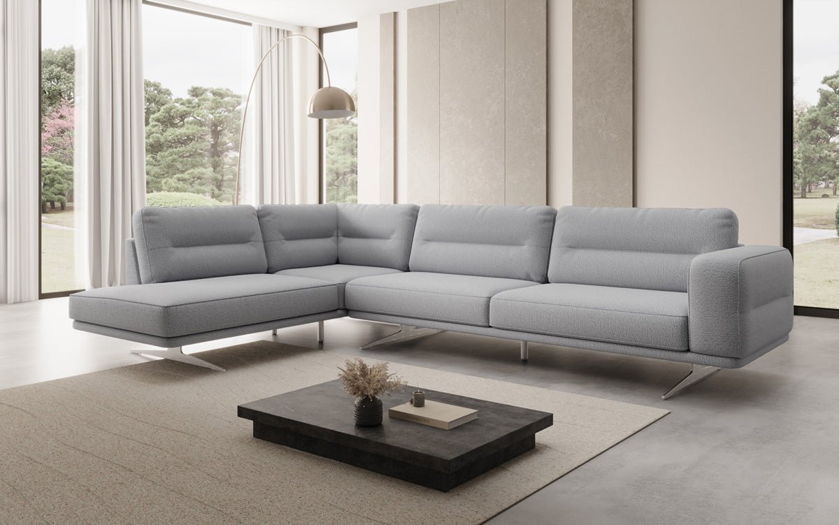 Designer-L-Sofa zou Torino am Bouclé