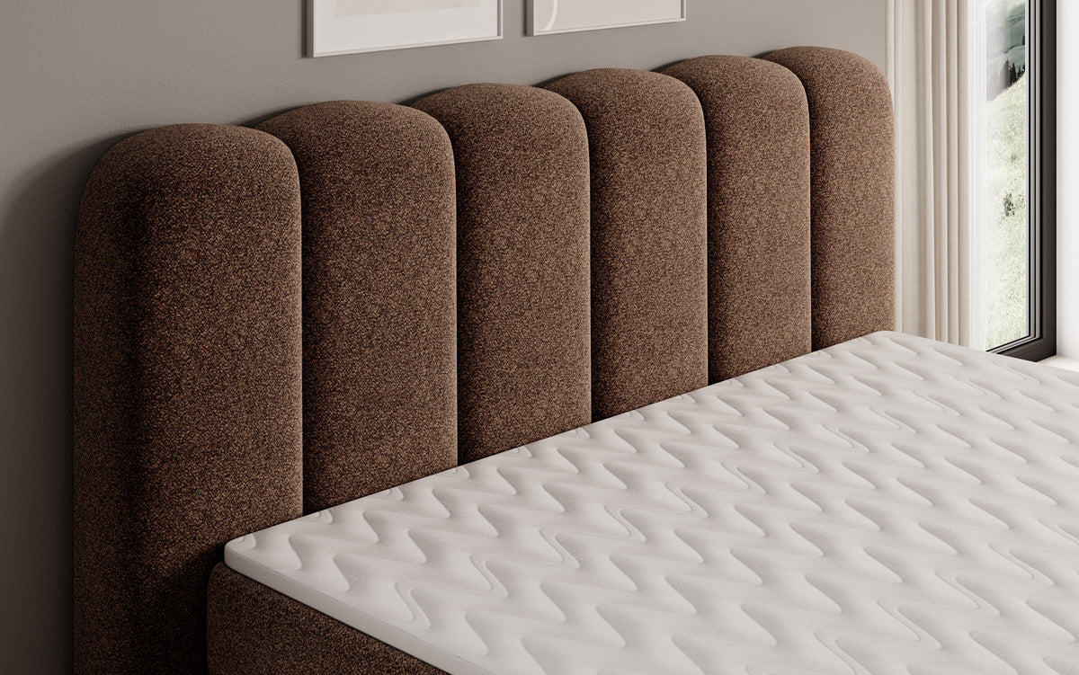 Lit boxspring Bologna en tissu texturé avec espace de rangement