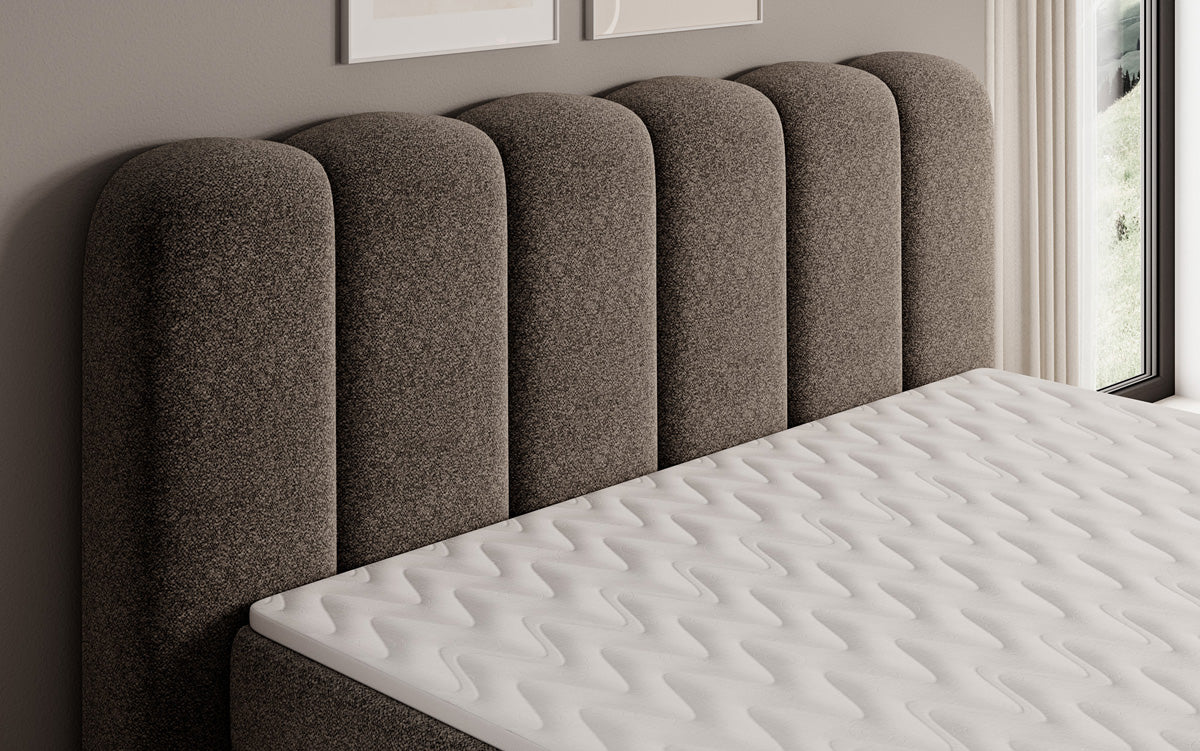 Lit boxspring Bologna en tissu texturé avec espace de rangement