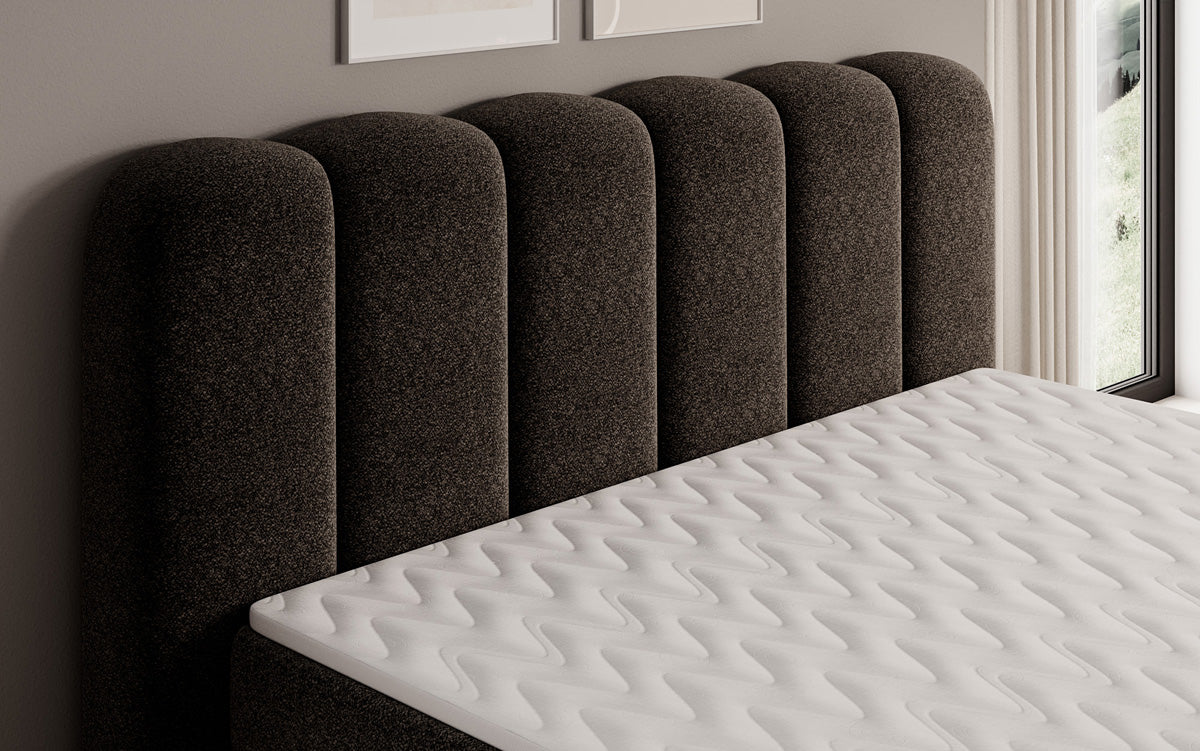Lit boxspring Bologna en tissu texturé avec espace de rangement