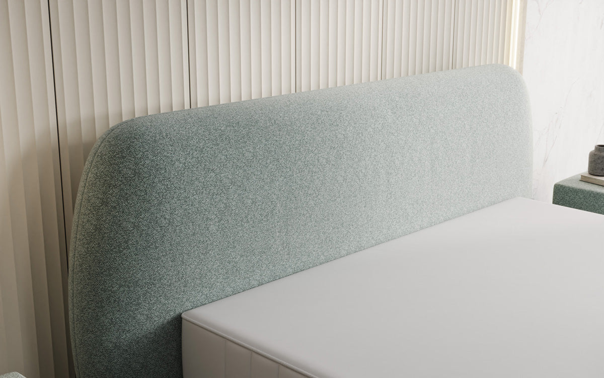 Designer upholstered bed Nella in textured fabric with storage space