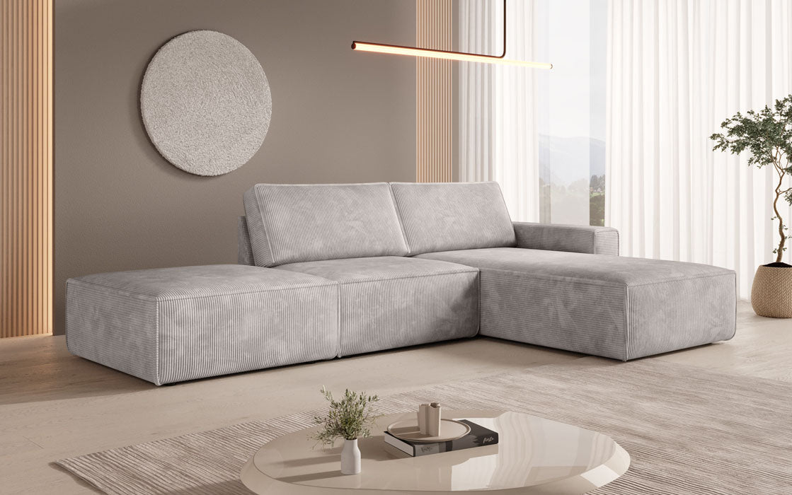 Modulärt Ecksofa Yuma mat engem Beistellhocker aus Cord