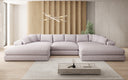 Canapé design Bernardo U avec large ottomane en tissu texturé