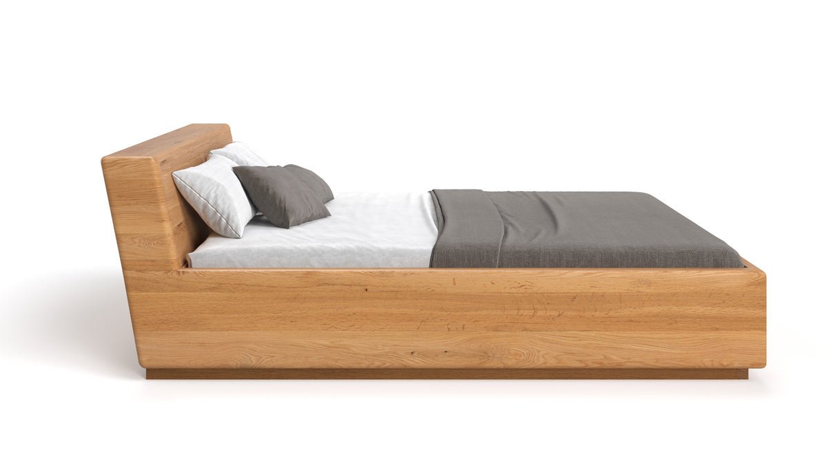 Lit en bois massif Calveno en chêne avec rangement et tête de lit inclinée