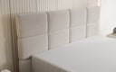 Lit boxspring Nessa avec pieds hauts en Peluche Bouclé