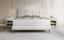 Lit boxspring Nessa avec pieds hauts en Peluche Bouclé