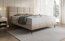 Lit boxspring Nessa avec pieds hauts en Peluche Bouclé