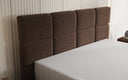 Lit boxspring Nessa avec pieds hauts en Peluche Bouclé