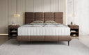 Lit boxspring Nessa avec pieds hauts en Peluche Bouclé