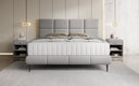 Lit boxspring Nessa avec pieds hauts en Peluche Bouclé