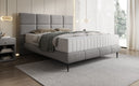Lit boxspring Nessa avec pieds hauts en Peluche Bouclé