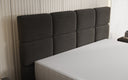 Lit boxspring Nessa avec pieds hauts en Peluche Bouclé