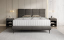 Lit boxspring Nessa avec pieds hauts en Peluche Bouclé