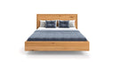 Designer wooden bed Celestia made of solid oak in a floating appearance
