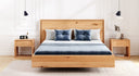 Designer wooden bed Celestia made of solid oak in a floating appearance