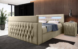 Boxspringbett Menzogna mit TV Lift, USB und Stauraum (2 Schubladen) - Luxusbetten24