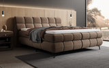 Boxspringbett Milla Strukturstoff in Braun (Raven 45) – Milieu seitlich